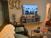 Large TV in living room please every bedroom has a TV