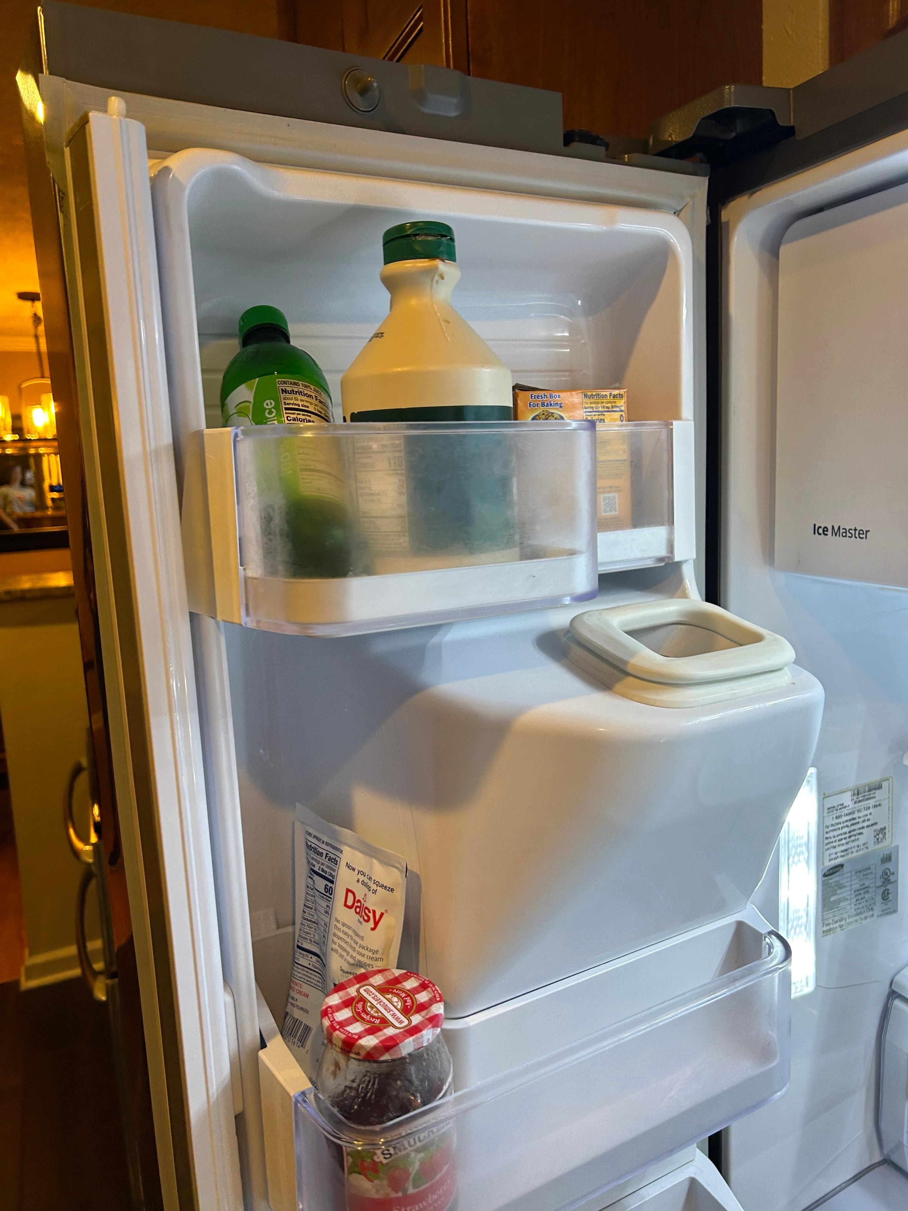 Still more leftover and used food in refrigerator