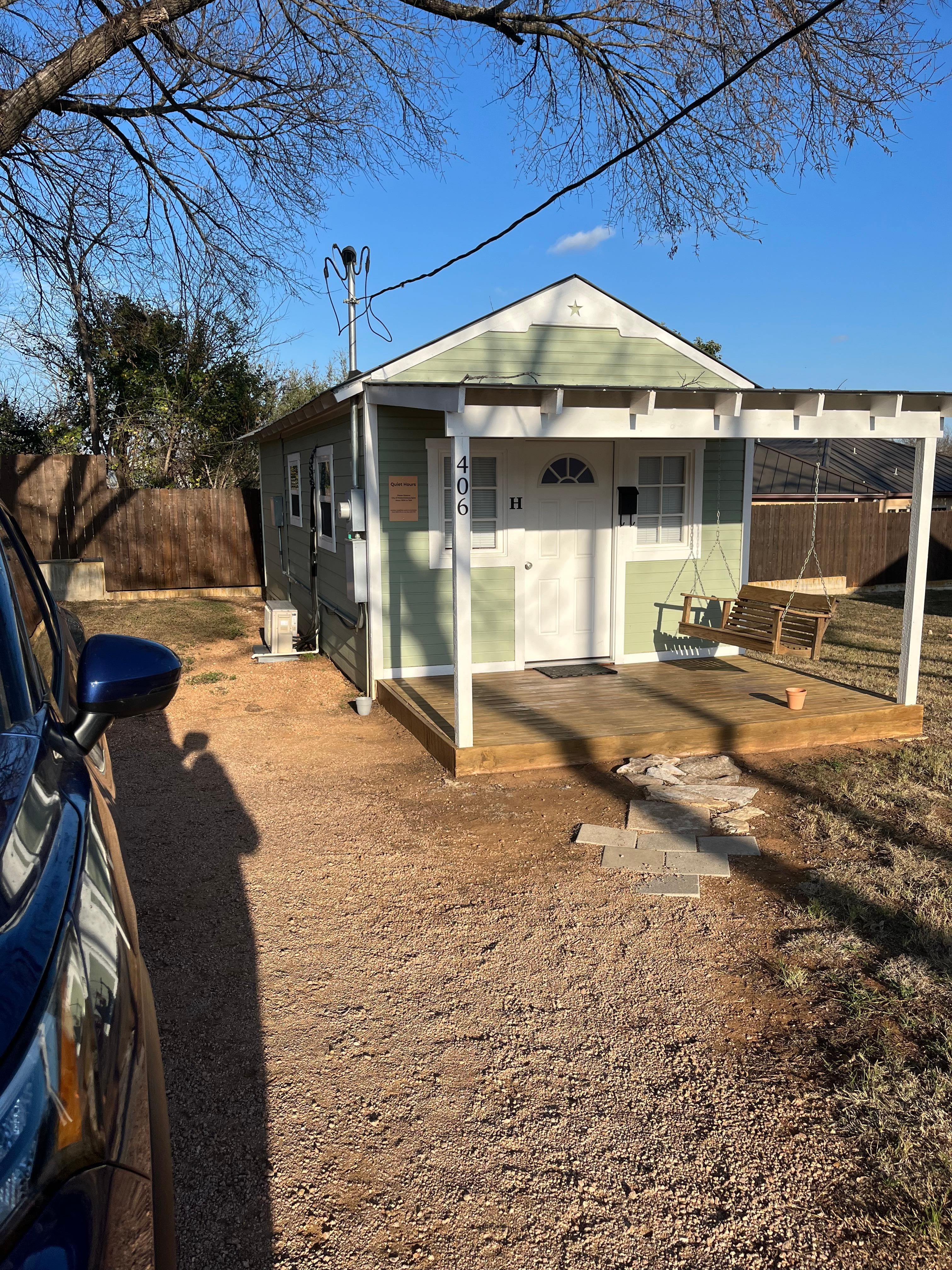 The outside of our cottage. It sat back from the street. 