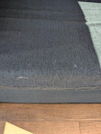The stains on sofa covers. We were able to wash them ourselves in the washing machine and that was successful.