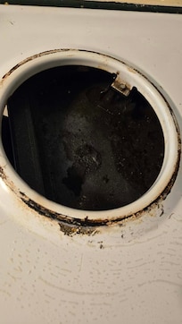 Burnt food and grease underneath all the burners