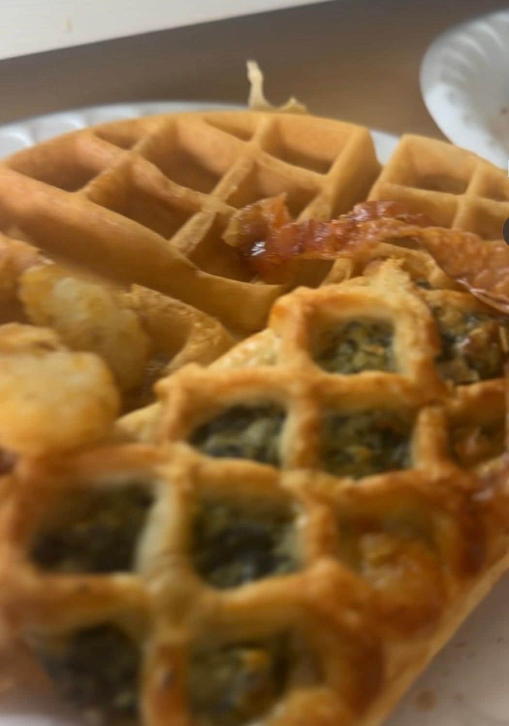 Awesome breakfast. I grabbed waffles, tater tots, bacon and a spinach & feta cheese pastries. 