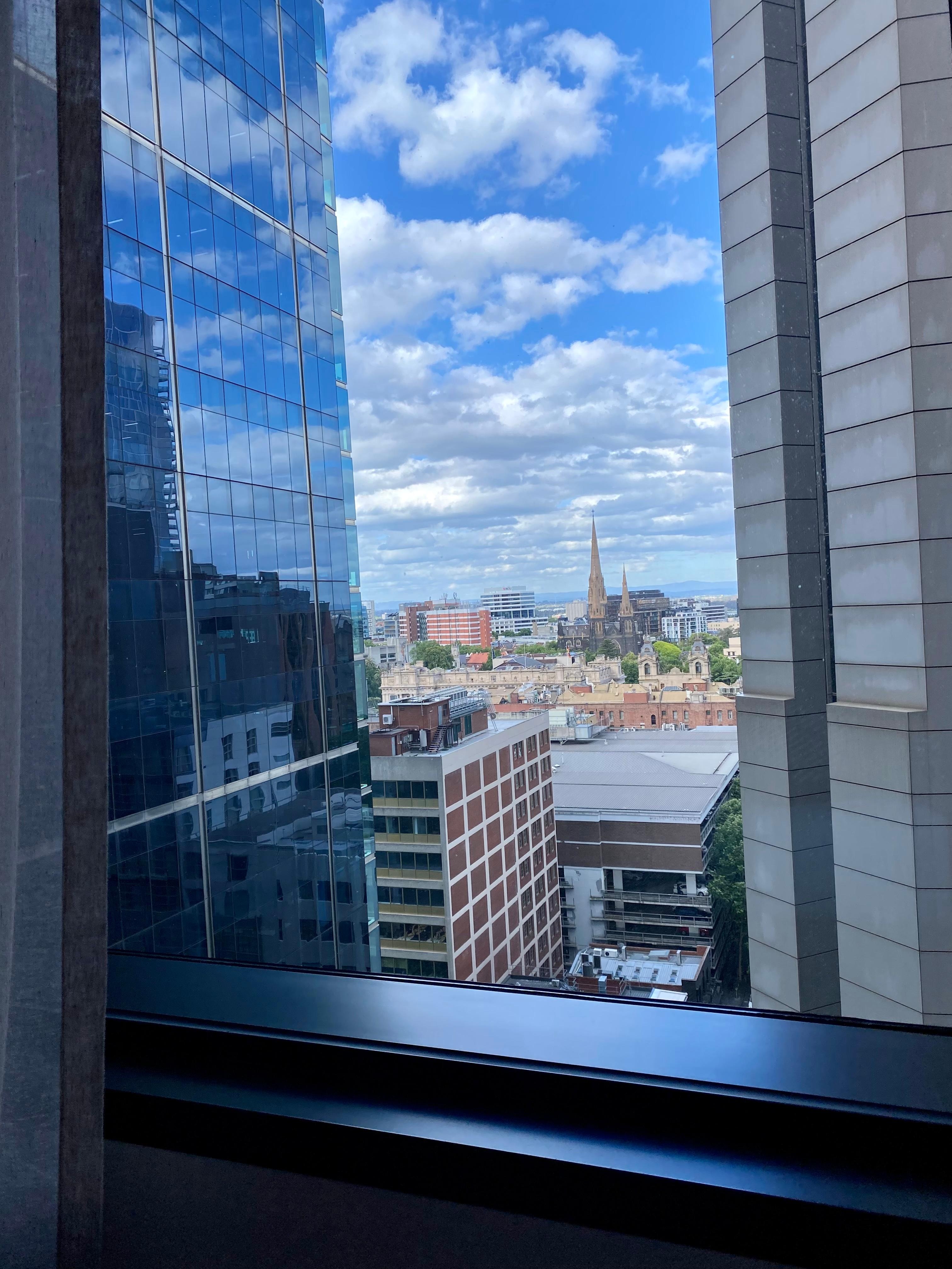 View of the cathedral and parliament building and out to Yarra Ranges NP from my room. 