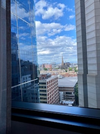 View of the cathedral and parliament building and out to Yarra Ranges NP from my room.