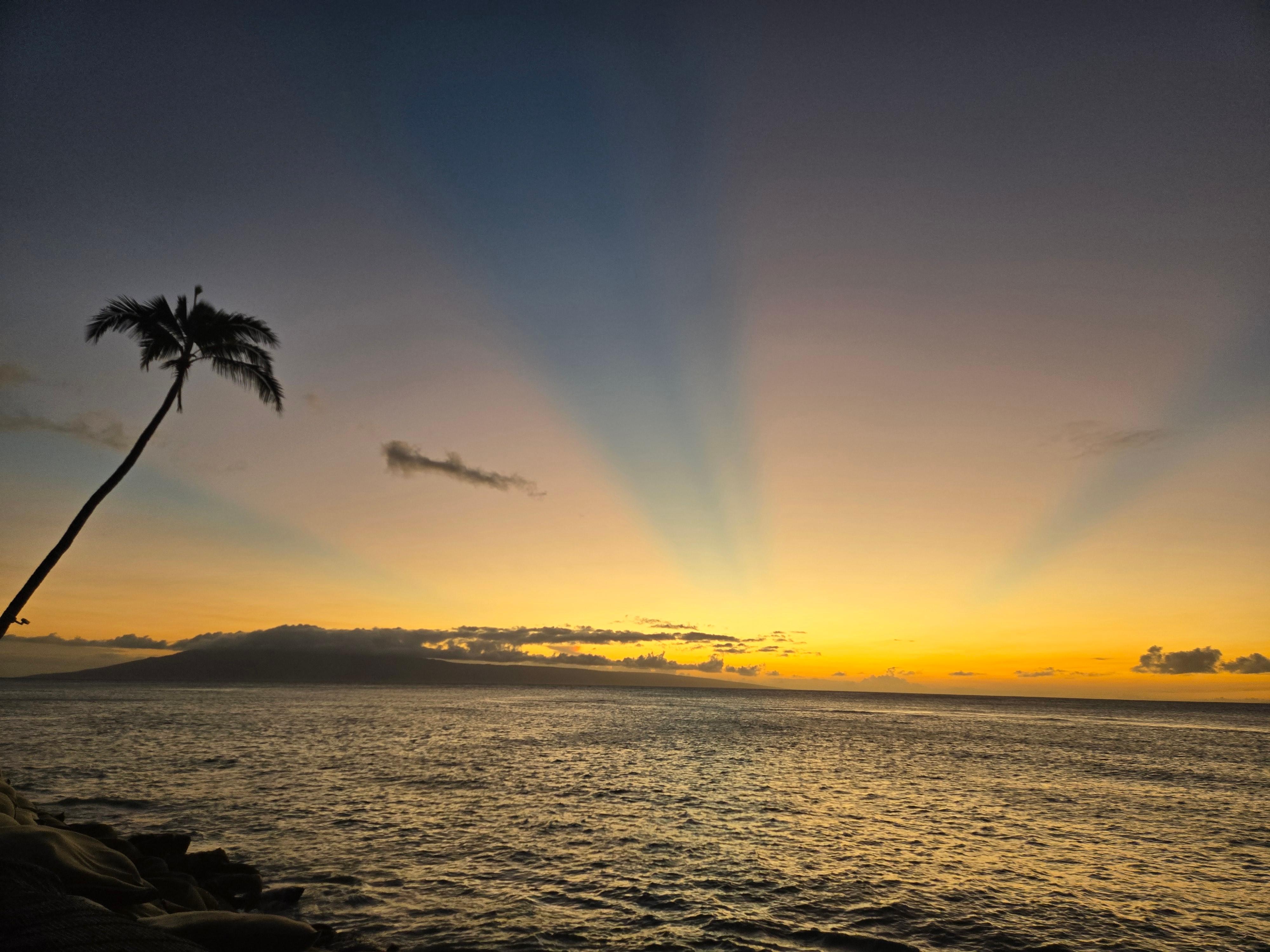 Sunset from the beach in front of pool.