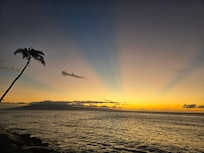Sunset from the beach in front of pool.