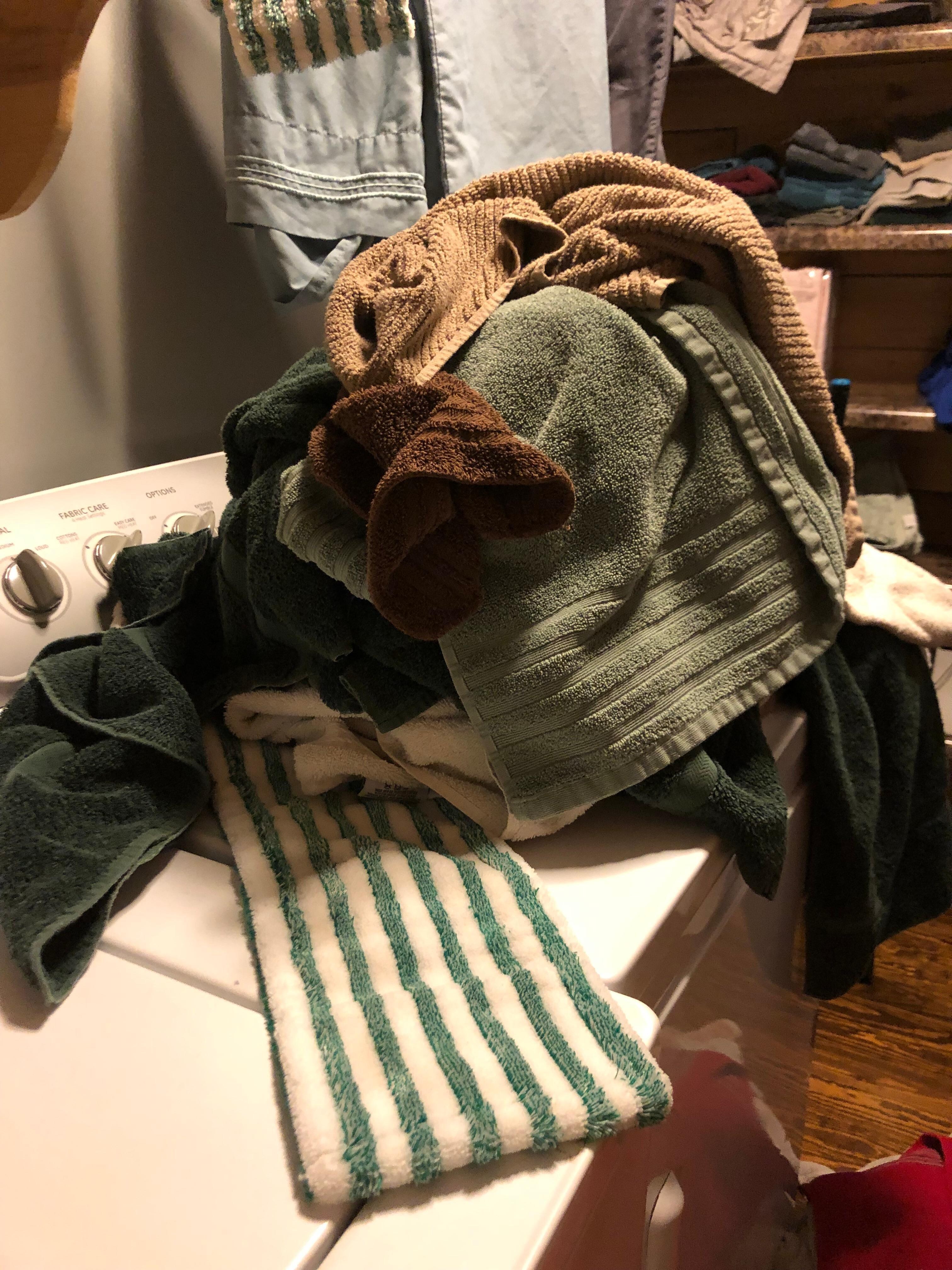 Dirty mop heads being washed with laundry we use on our face.  This is a state violation 