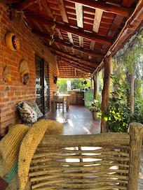 Outdoor wrap around patio with outdoor kitchen.