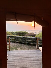 View from inside Lihou cabin at sunset