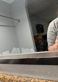 toothpaste spit on mirror