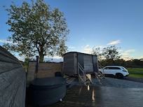 Hot tub, bathroom and kitchen. Parking individual spot close to pod made it easy to unpack