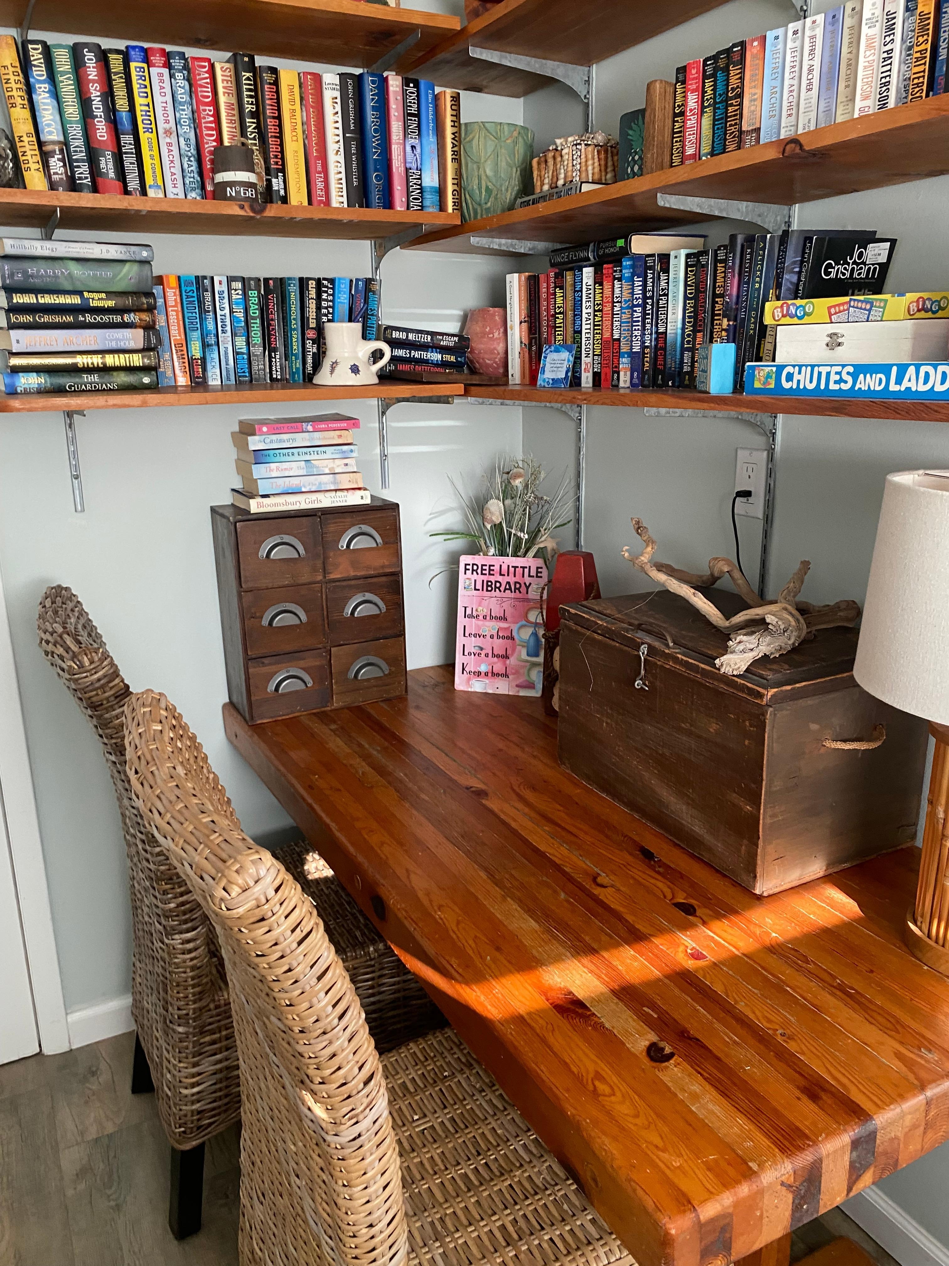 Books for exchange or keep inside laundry room. 