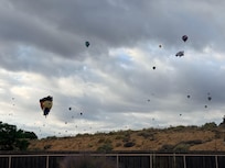 Balloons flew right over our rental each morning