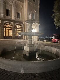 Garden fountain at night.