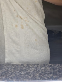 Stained bath towel