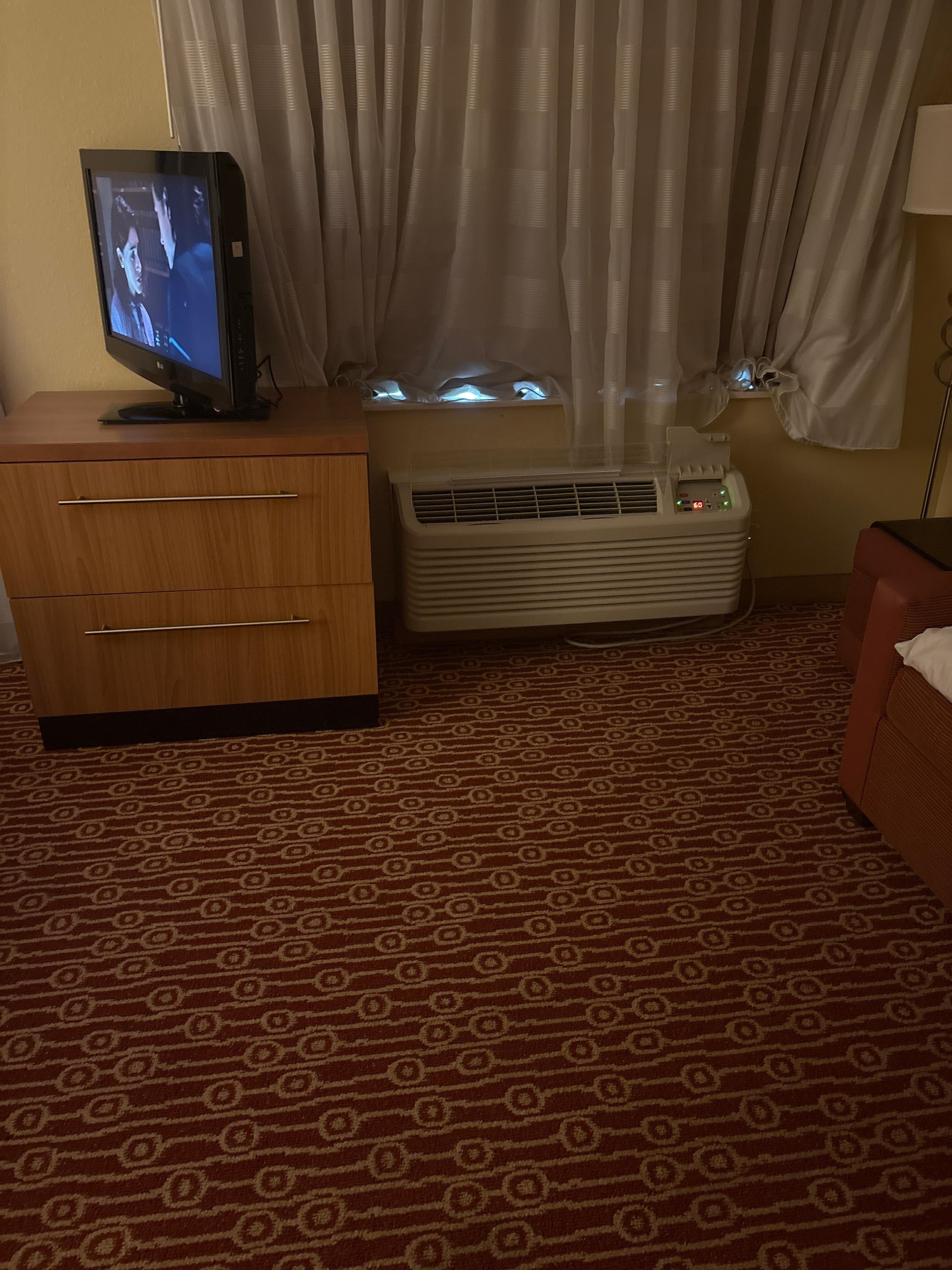 The furniture is literally blocking the AC in the room and it takes forever to get the room to cool down.