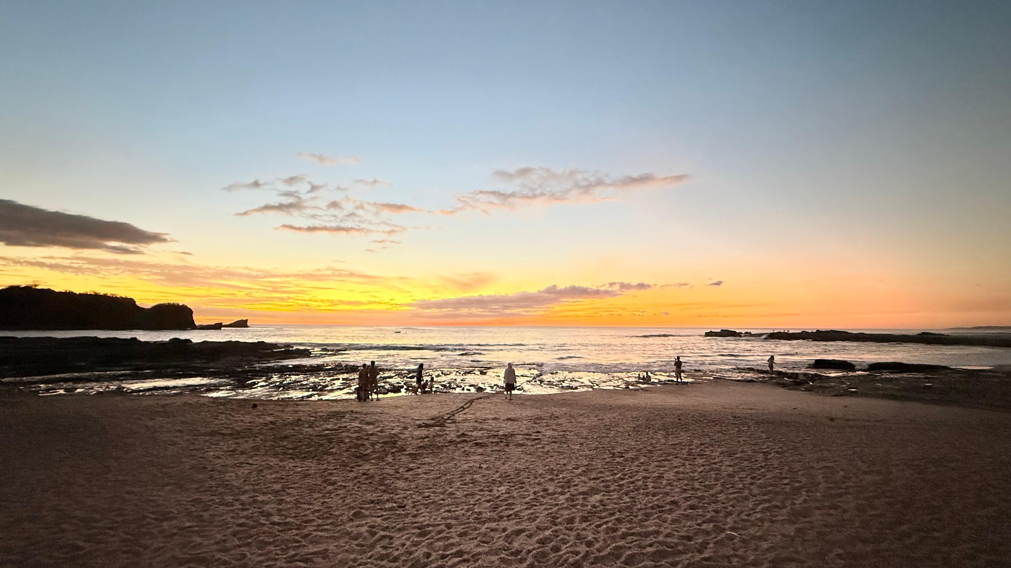 Nearby beach at sunset — eat at La Luna in Pelada… a $10 Tuktuk (taxi) ride from Living Hotel. 