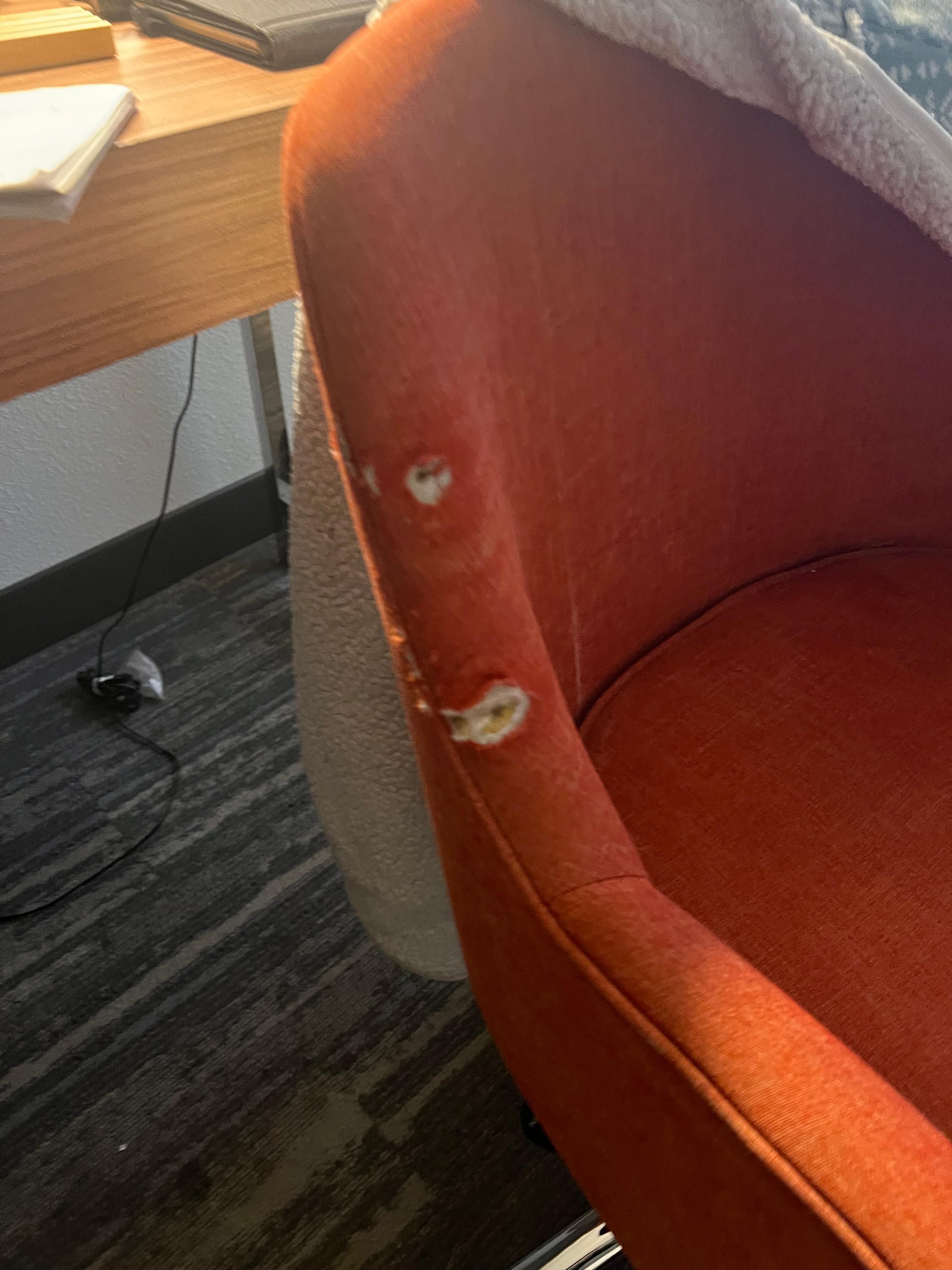 Desk chair, it had these tears on both sides