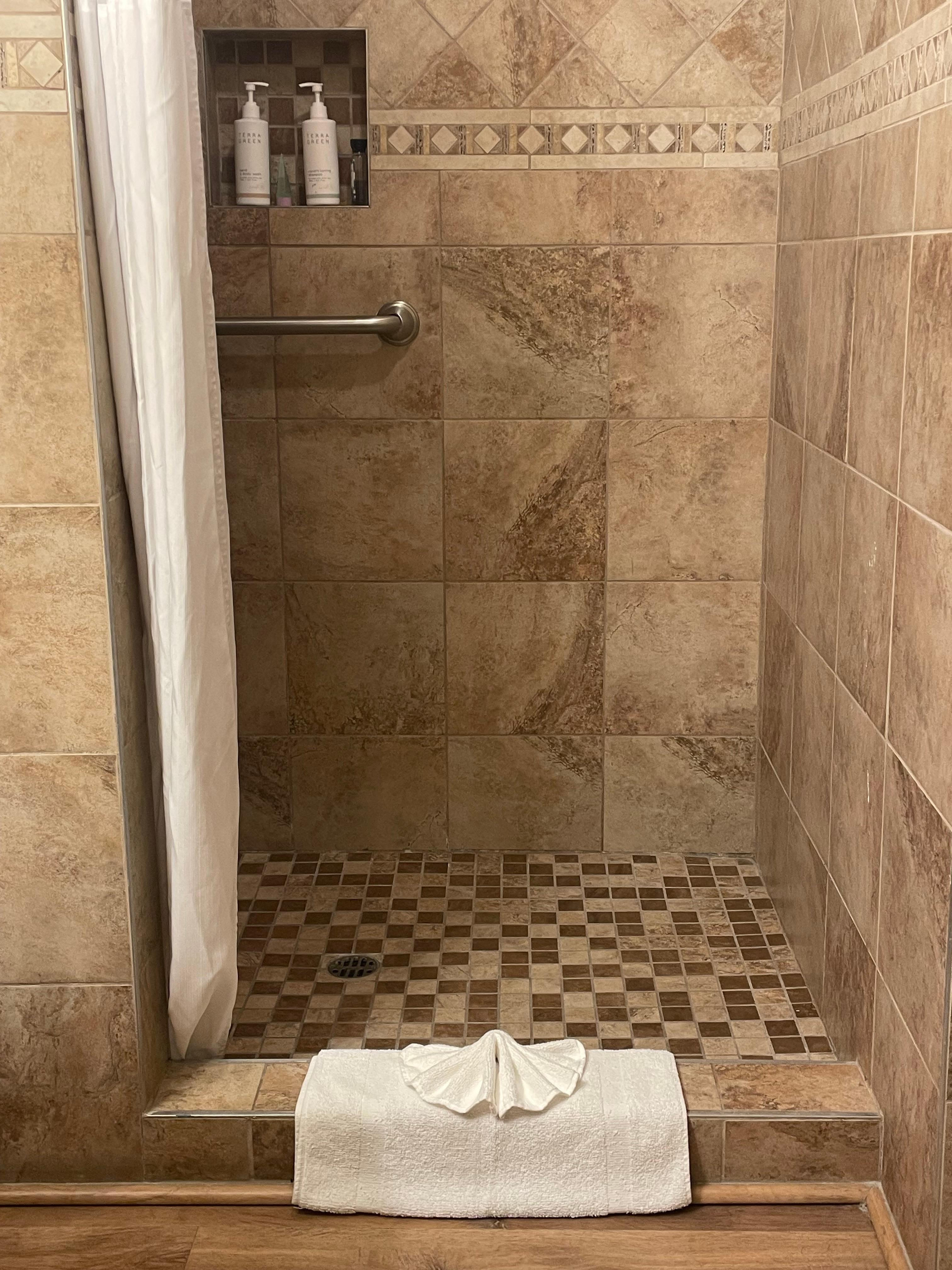 Beautiful shower. Water pressure mediocre. 