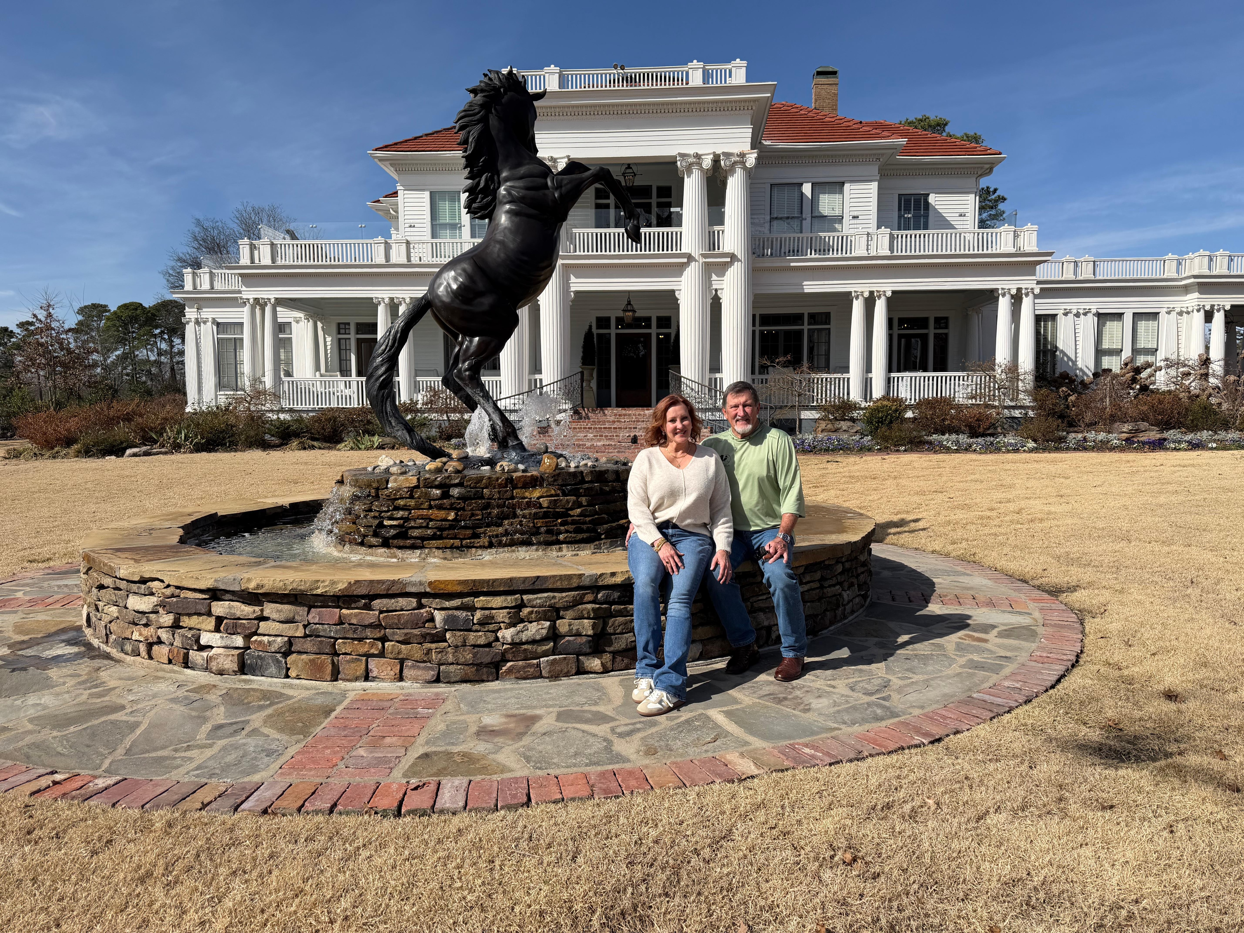Beautiful horse statue fountain. Property is across from Oaklawn Race Track. 