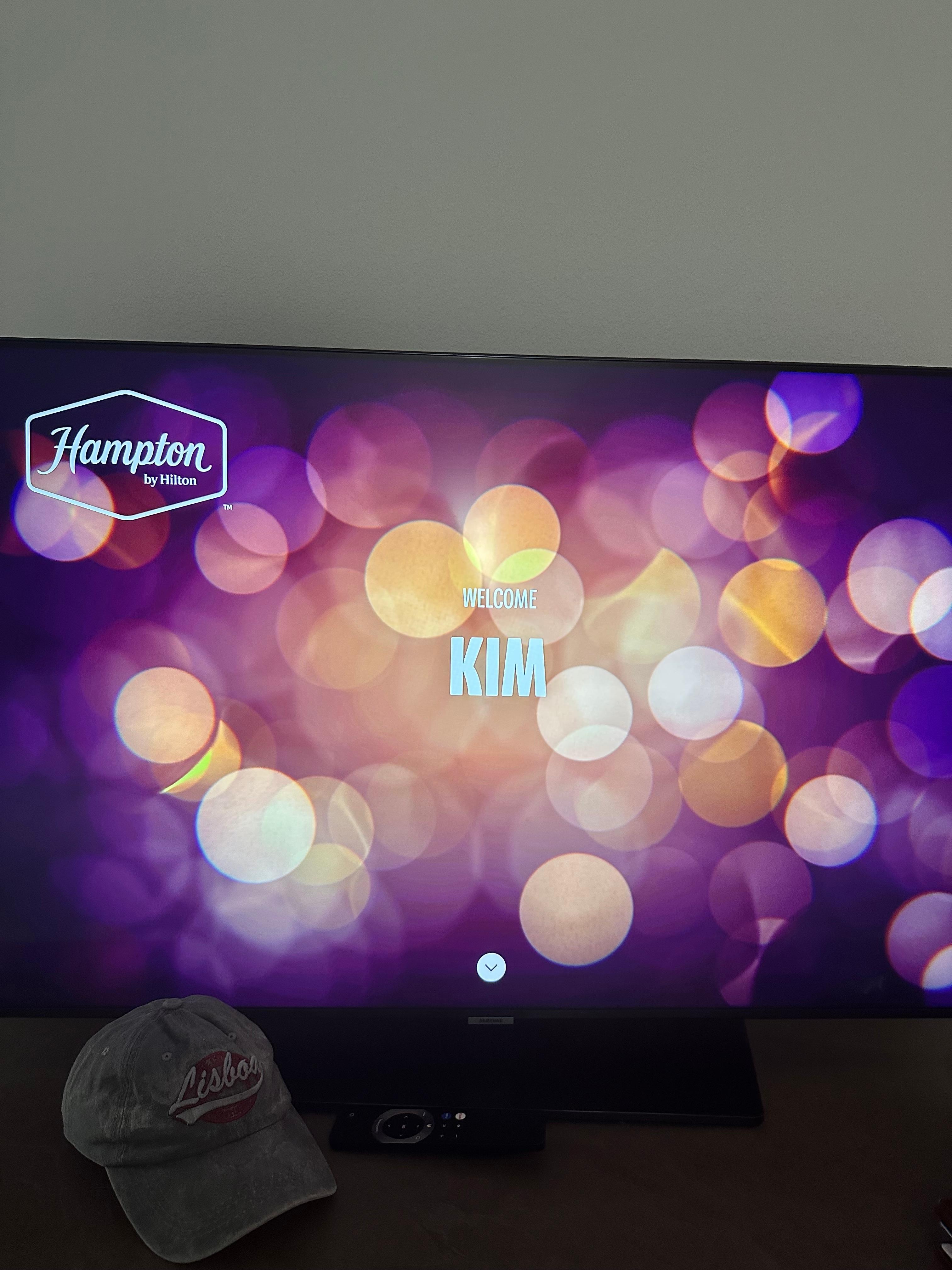 The TV welcomed into the room. Nice touch!