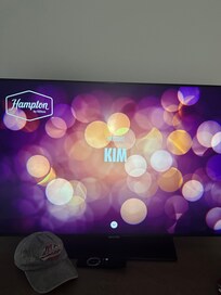 The TV welcomed into the room. Nice touch!