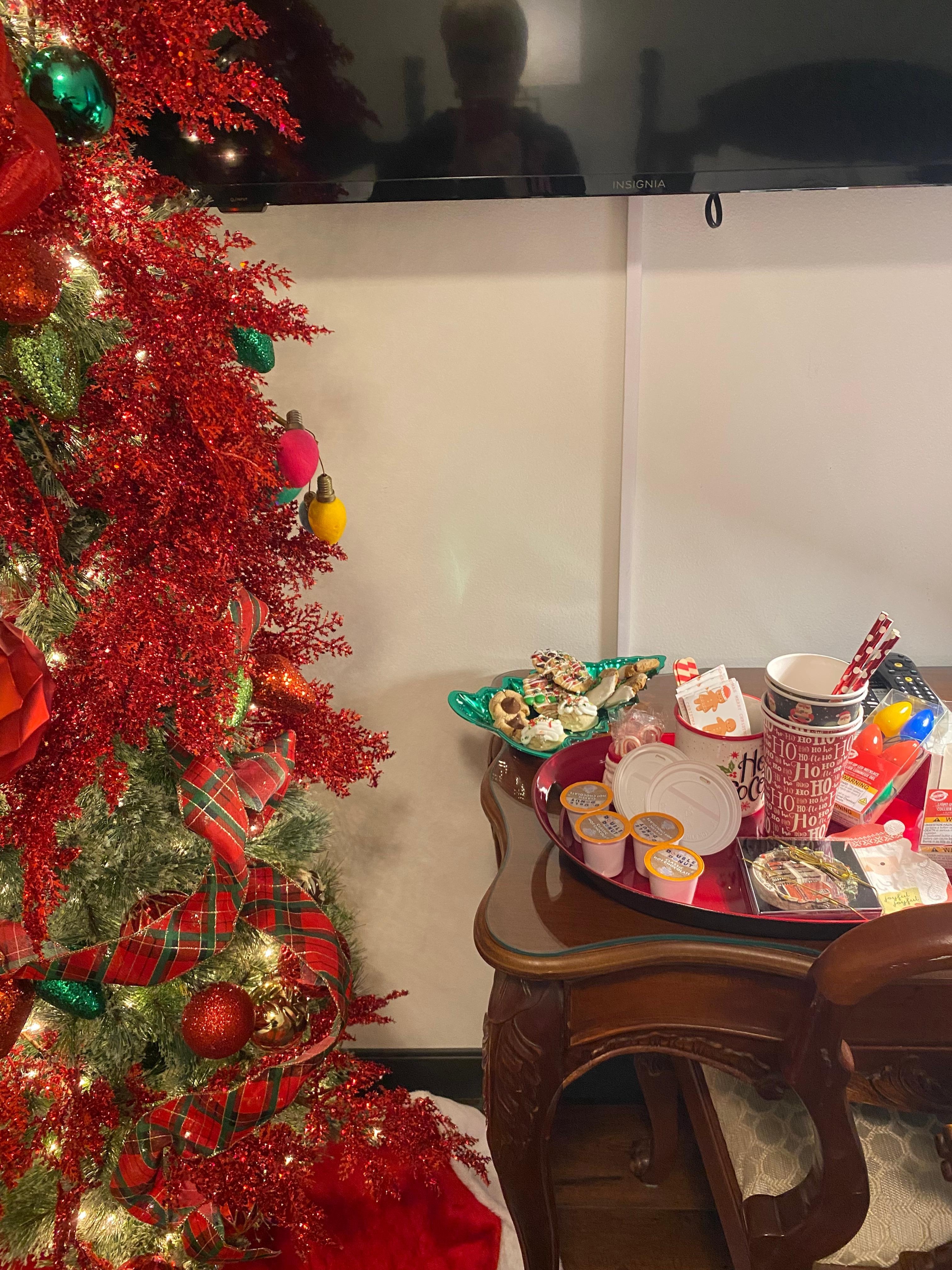 Hot cocoa, delicious cookies and Christmas tree. 