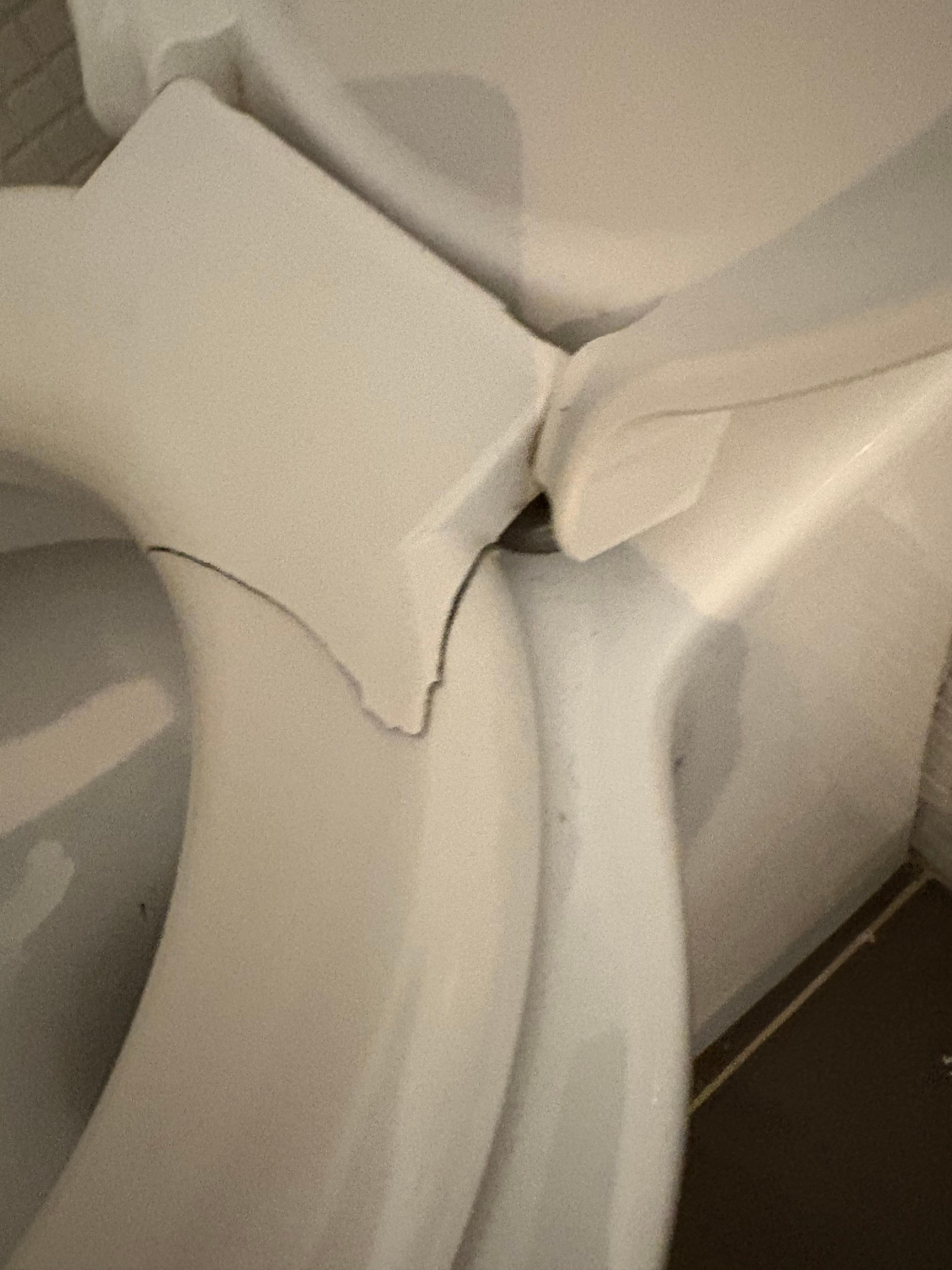 One of 7 broken toilet seats