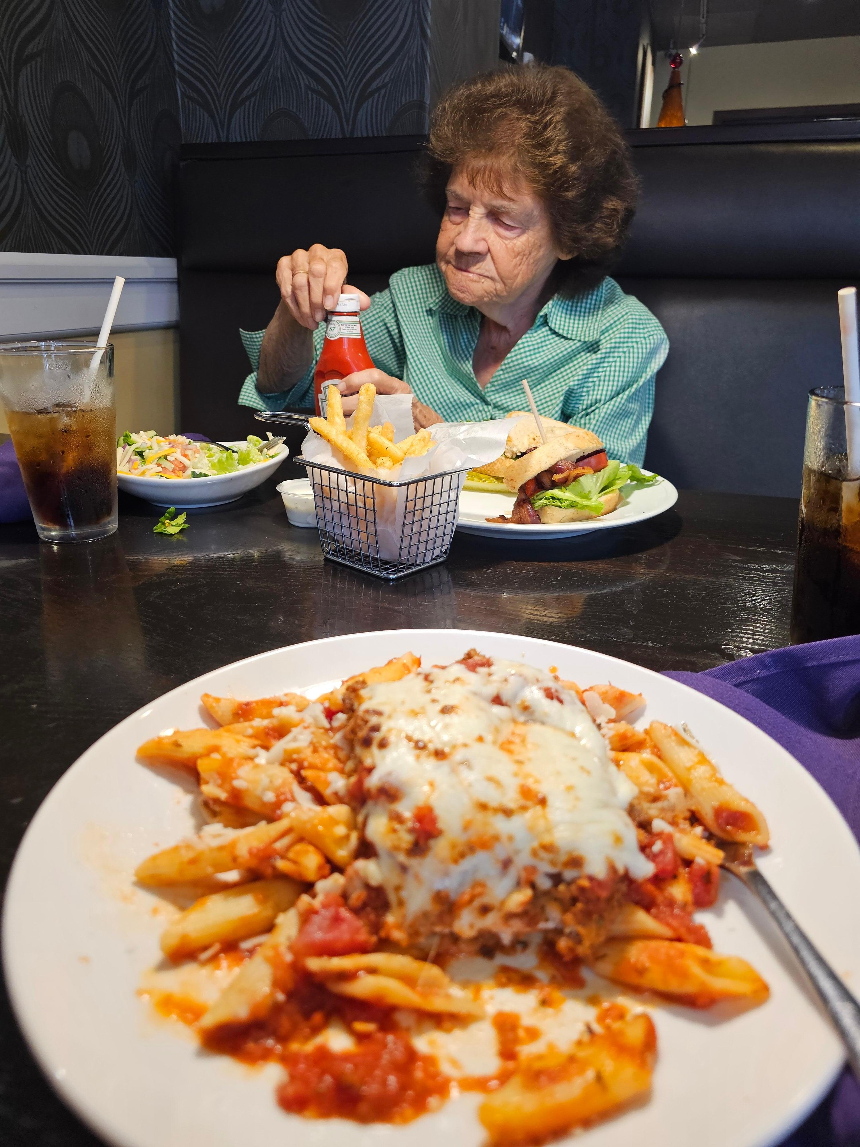 Delicious food. Doesn't she look hungry?