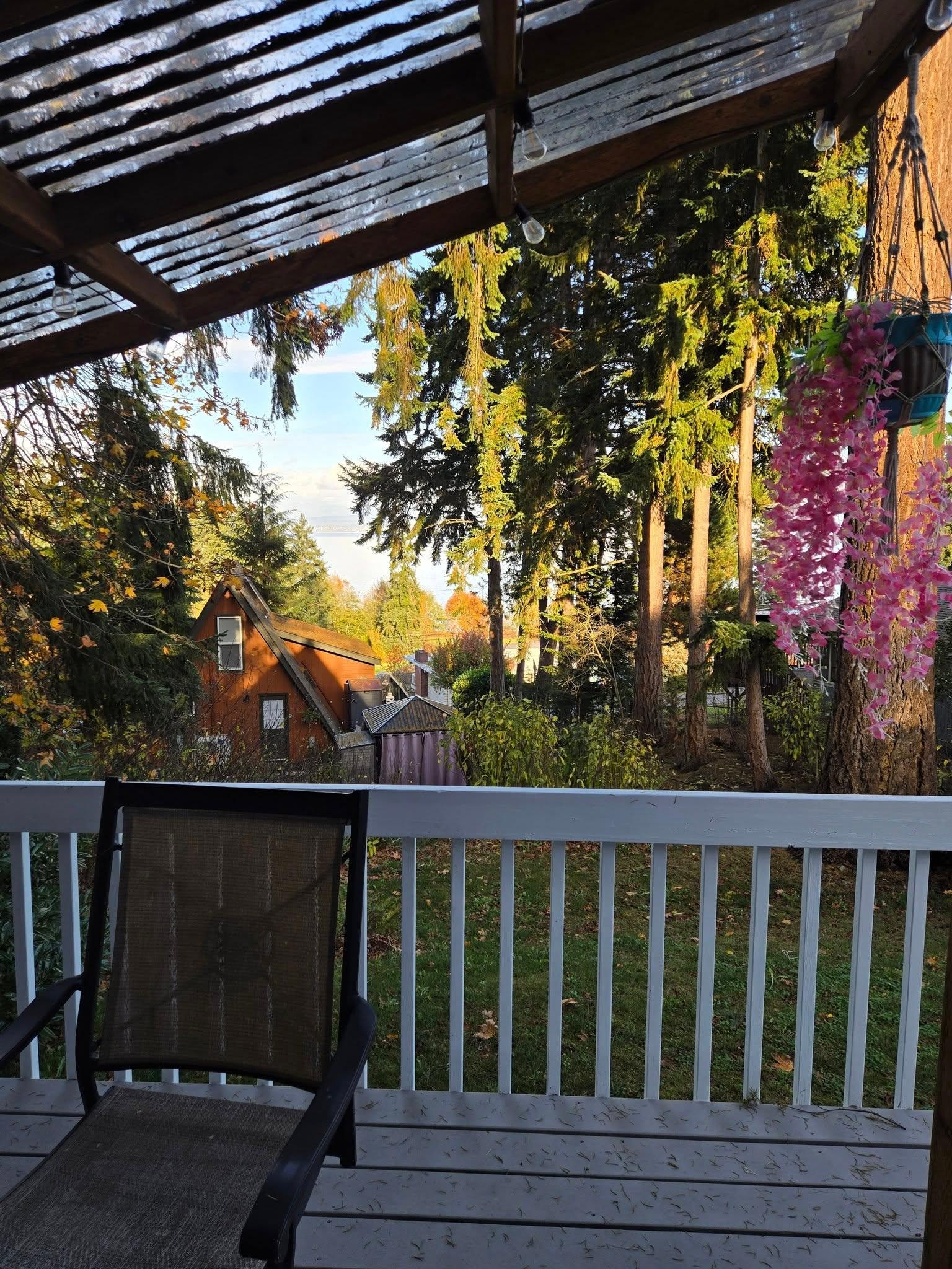 The view from the porch is gorgeous - all the greenery, Port Susan in the distance - definitely a perfect spot to have your family.