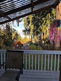 The view from the porch is gorgeous - all the greenery, Port Susan in the distance - definitely a perfect spot to have your family.