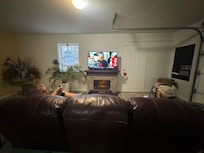 Our 2 men enjoying the Game Room at Pollys Place