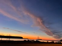 This photo is nice but it's better in person. Cloudy nights too. Eat at Sunset Harbor Grill right next door to see the view too.