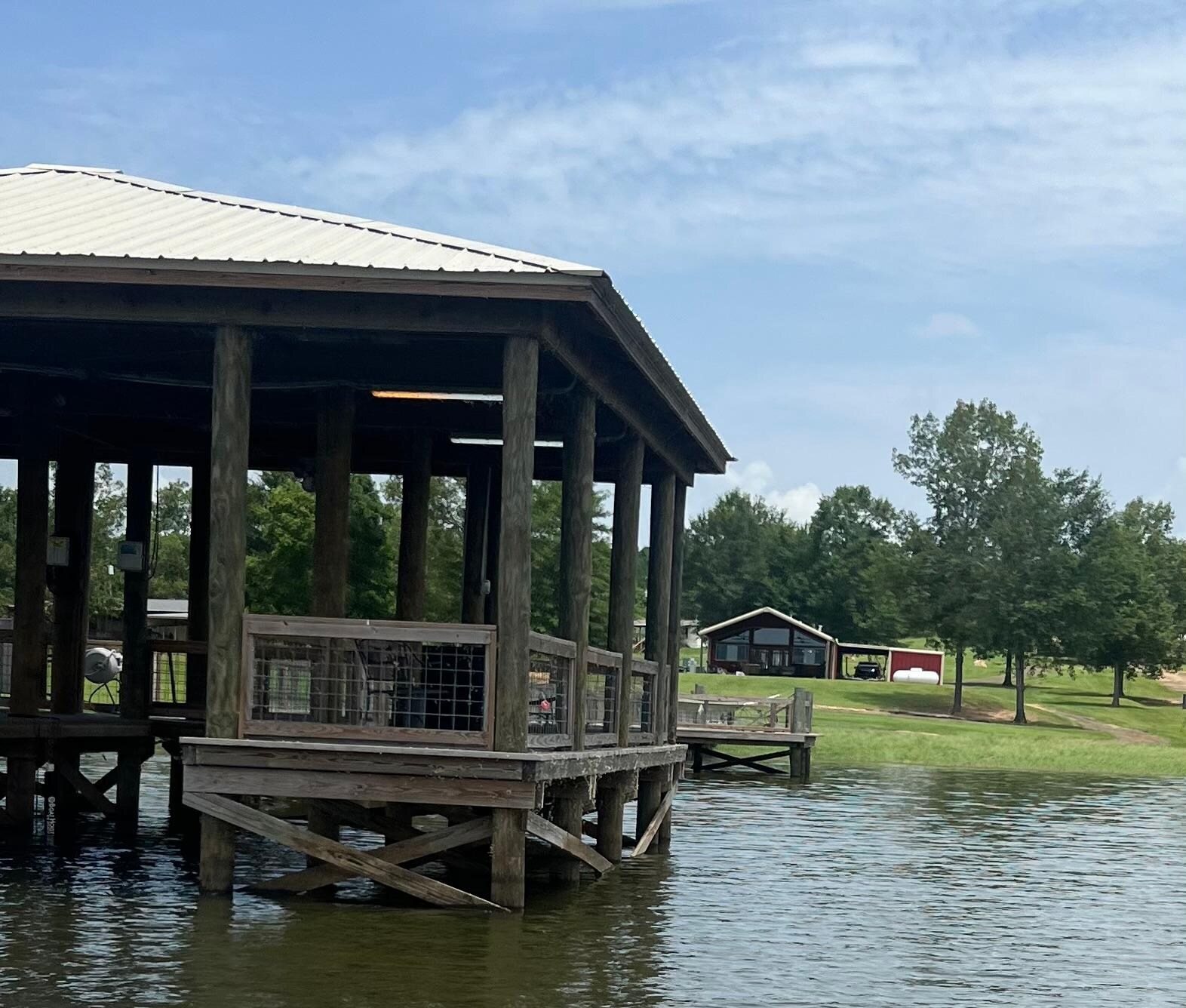 View from our boat of the dock and house
