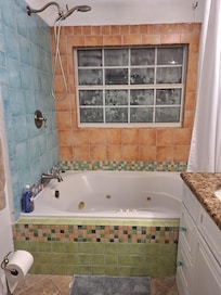 Shower needs updating. I am elderly and wouldn't try to get in and out of it.