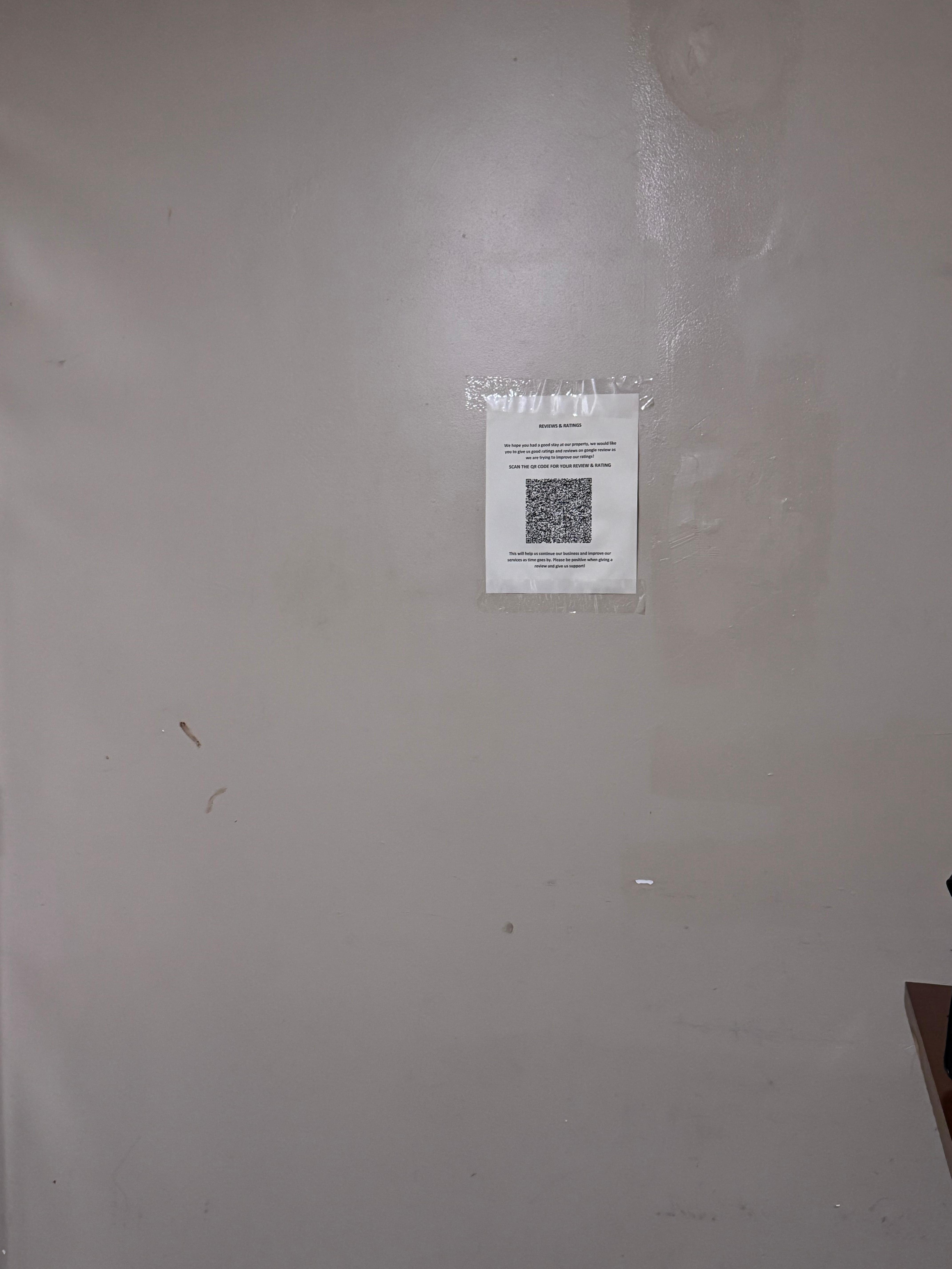 No decor just a rate us sign taped up. 