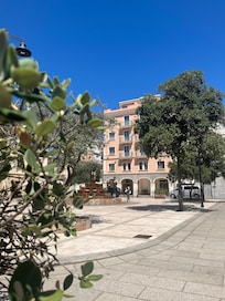 Piazza square with hotel.