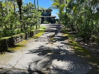 Driveway, leading to the front of the house .