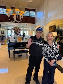 My wife and I in the lobby at the hotel.
