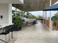 The rooftop area with hot tub