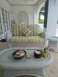 Access through the bedroom to relax by the pool and gardens.
