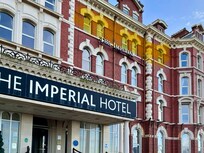 Ambassador Suite highlighted. L to R, living room, bedroom and bathroom.