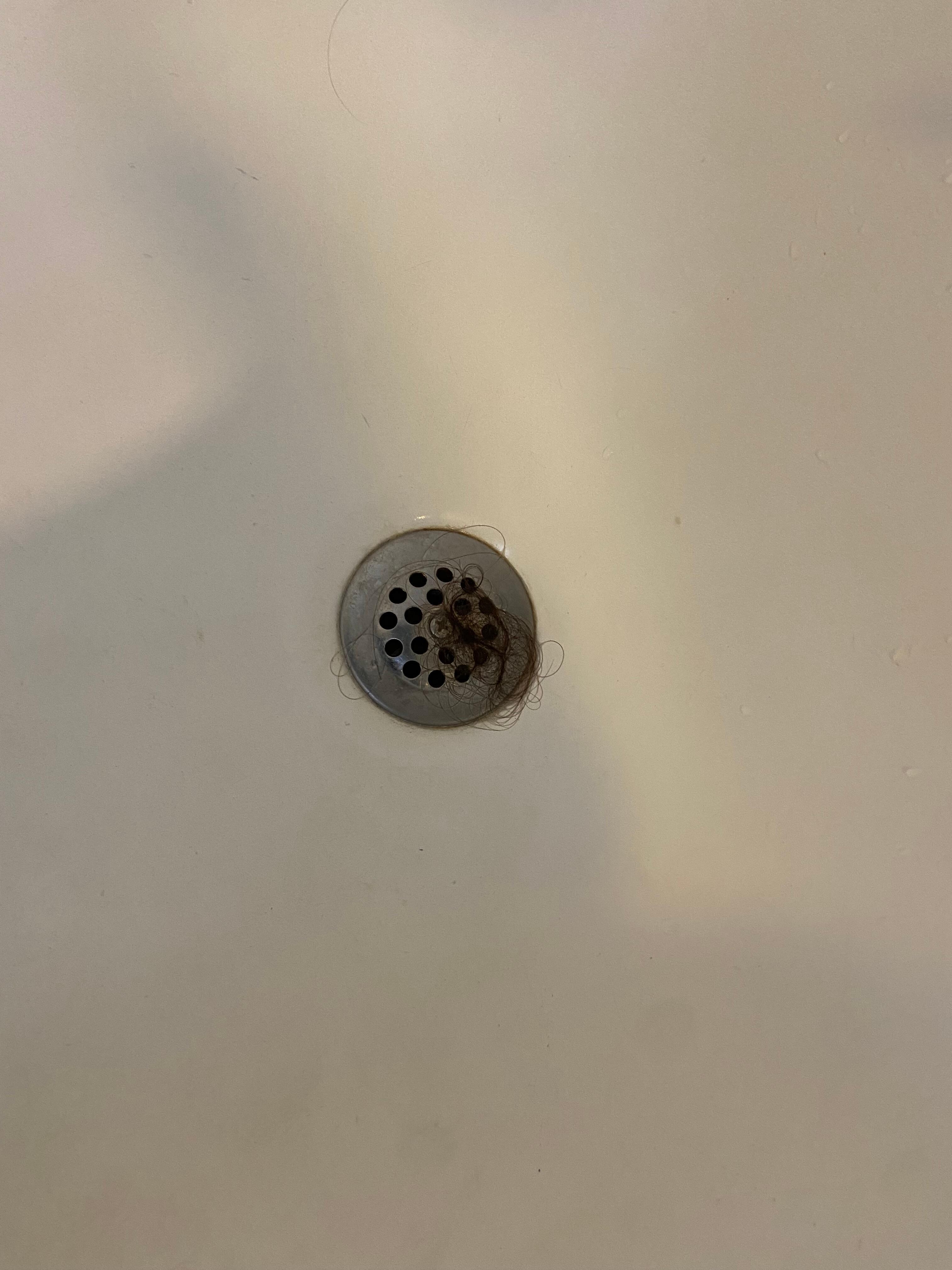 Hair in shower. 