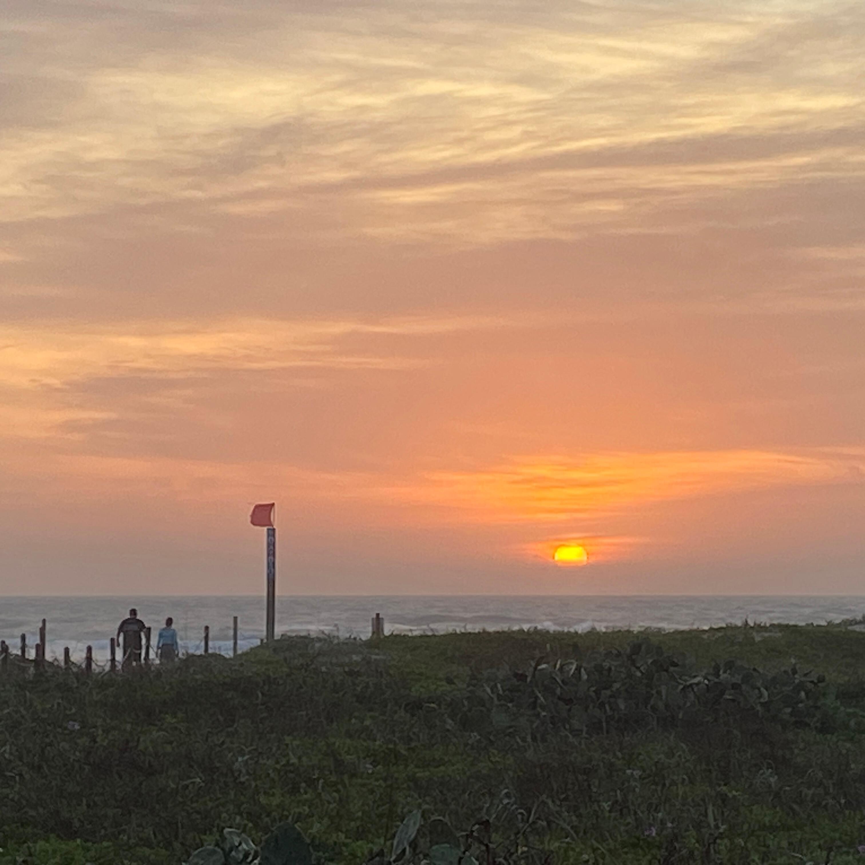 Just steps to the beach. This is sunrise each morning while walking my Lacy.