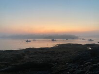 The view to the west from in front of the Ocean Point Inn just after sunset one evening.