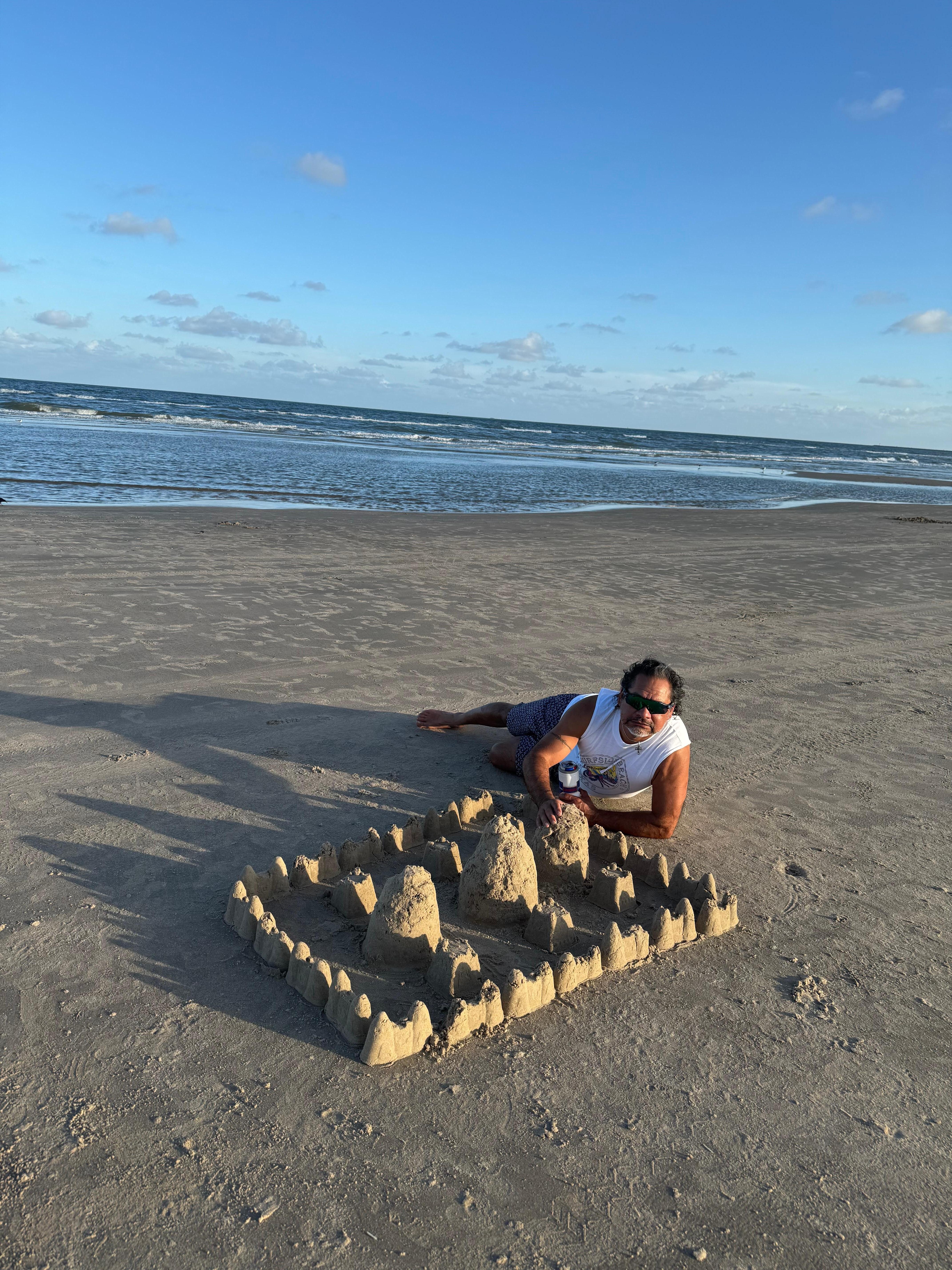 Stealing photo opps from the kids that left next to us.  Haha.   Late afternoon beach time.  