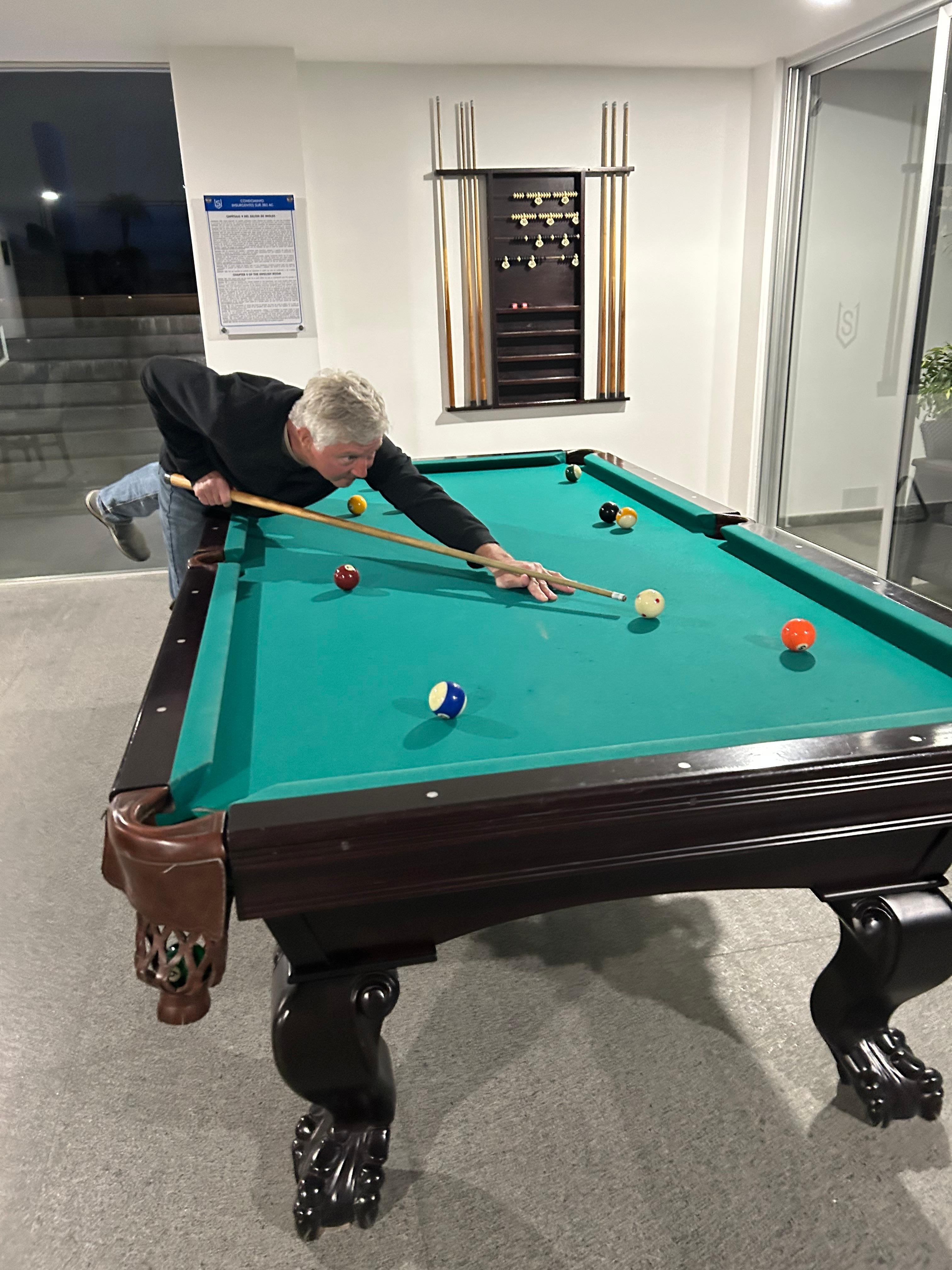 The English lounge enjoying a game of billiards!