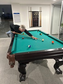 The English lounge enjoying a game of billiards!