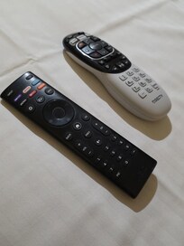 Two remotes, 1 for volume and 1 for changing channels