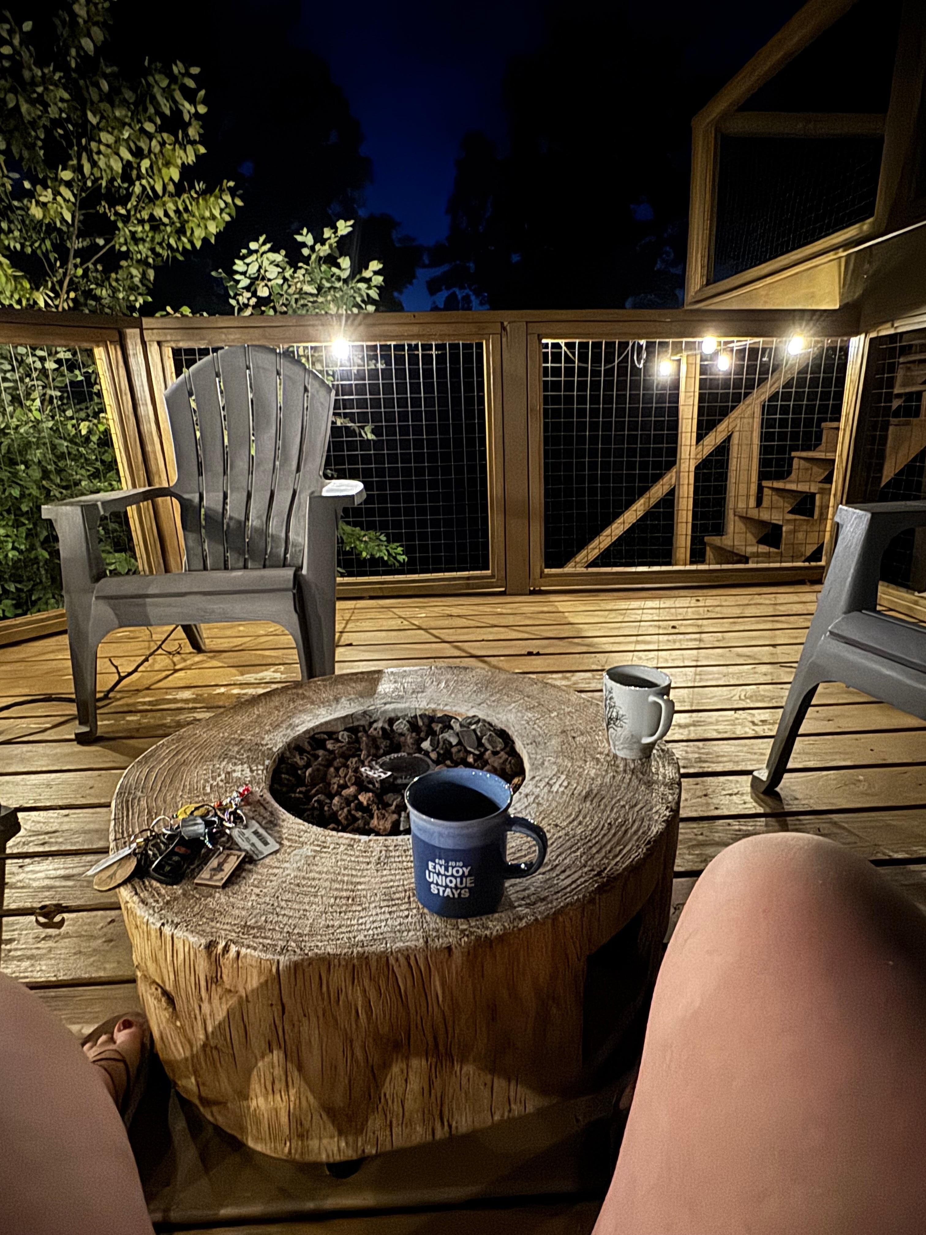 Outside the community kitchen, drinking hot cocoa that was provided for guest! 